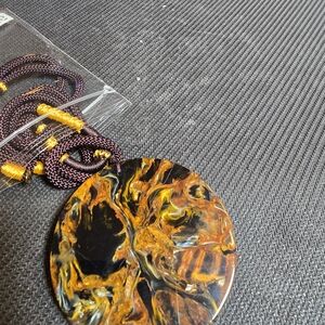 Elegant Black and Gold Pendant Necklace